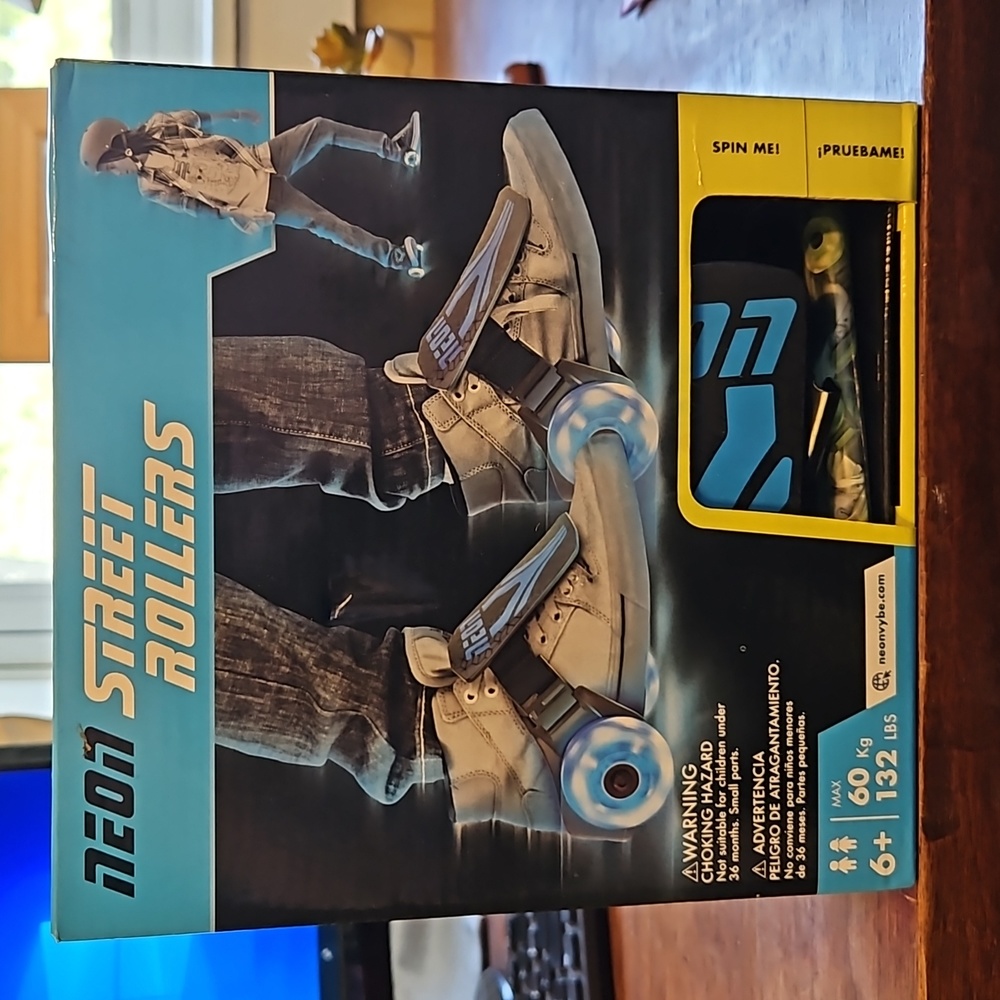 NIB Neon street rollers, adjustable and rated for up to 132lbs